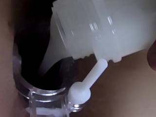 Spreading my pussy open with a speculum and filling it with fake cum until it's full