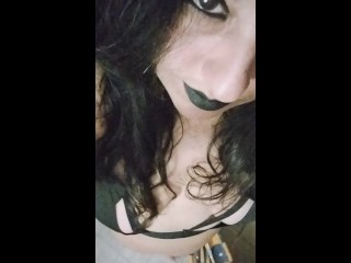 Smoking in a goth look provocative outfit