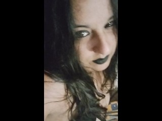 Smoking in a goth look provocative outfit