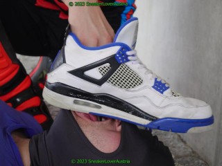 slave cleans my fox boots while sitting on my bike