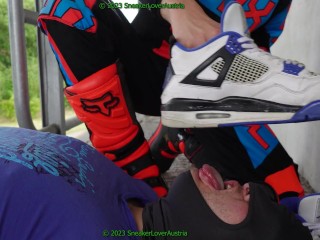 slave cleans my fox boots while sitting on my bike