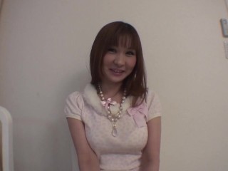 A solitary red-haired Asian girl engages in self-stimulation inside the flat