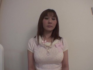 A solitary red-haired Asian girl engages in self-stimulation inside the flat