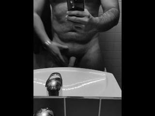 Hot guy in tighty whities pulls out his big soft cock in the office restroom