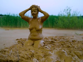 Orgasm in lake of mud