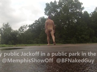 Risky public jackoff in the rain at a public park