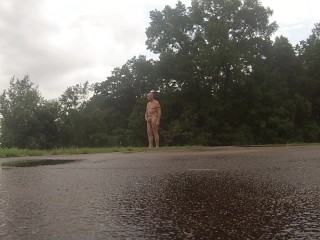 Risky public jackoff in the rain at a public park