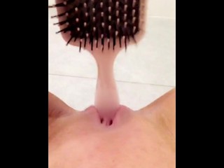 Naughty teen fucks her tiny pussy with hairbrush in school bathroom