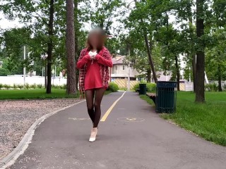 Sluty teen girl  walks in the park in a micro dress without panties (upskirt, no panties, stockings)