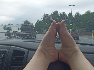 Bare feet in the grocery store parking lot