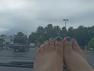 Bare feet in the grocery store parking lot