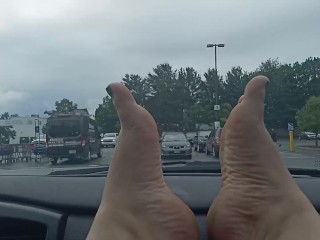 Bare feet in the grocery store parking lot