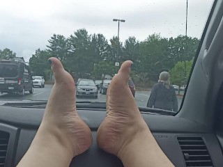 Bare feet in the grocery store parking lot