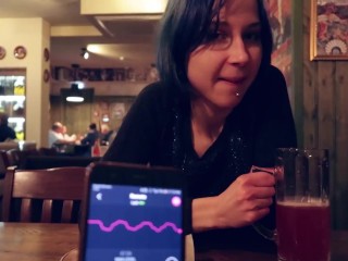 I took control of my stepsister's vibrator in the bar and brought her to orgasm.