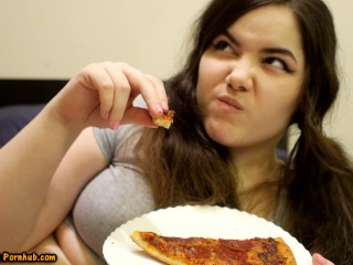 Bored Girl Chews On Pizza