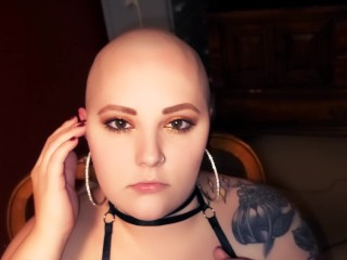 Bald Babe rubs her head