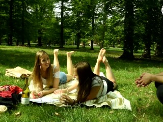 Two barefoot girls in park having their feet worshiped by a stranger (foot worship, public feet)