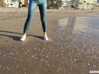 Wet shoot on a public beach with Crazy Model. Risky outdoor masturbation. Foot fetish. Pee in jeans