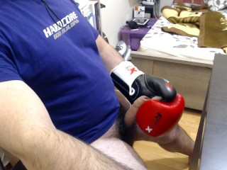 Fetish : Dimitris Nastymind Strokes and cums with a red boxing glove