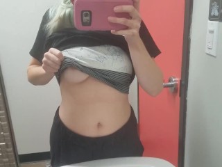 Playing with my big tits at work in the loo