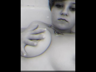 Playing with boobs while bathing. 