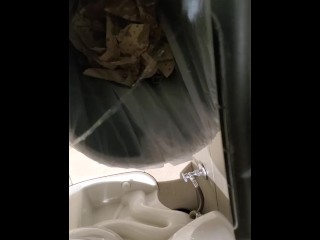 Shakily Pissing in the Garbage