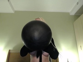 Blow big black balloon & pop with nails