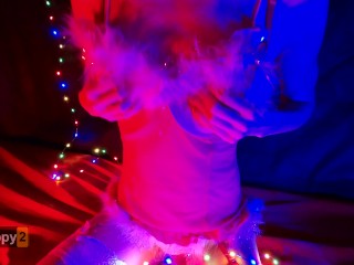 Snow Maiden brings herself to orgasm in Christmas lights