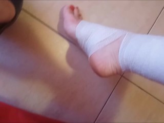 Foot & ankle fetish bandage with red nail polish