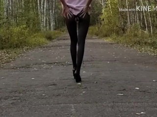 Walking in the park without panties in a mini dress and showing pussy