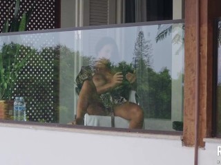 Spying on slut neighbor masturbating on balcony
