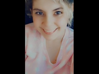 Teasing, cute girl spreads her legs in the car