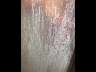 Watching her shower, she briefly presses her tits & ass on the glass door to tease me with her body 