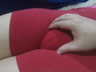 My red shorts hiding my tight pussy mound.