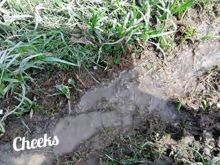 Bare feet in mud