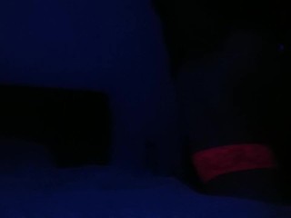 Crossdresser streaptease under UV light 