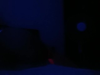 Crossdresser streaptease under UV light 