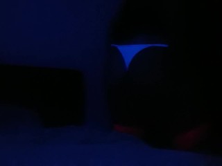 Crossdresser streaptease under UV light 