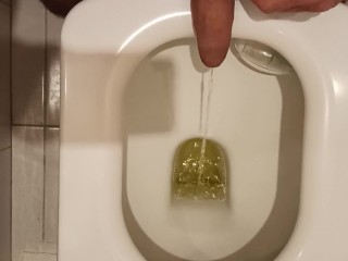 I pee in the toilet and then jerk off my dick.