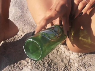 Lucky Heineken bottle found at the beach got into my Juicy Pussy. Do you like my pissed lingerie? 