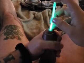 Cumming while sounding with green glowstick