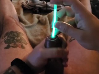 Cumming while sounding with green glowstick