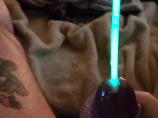 Cumming while sounding with green glowstick