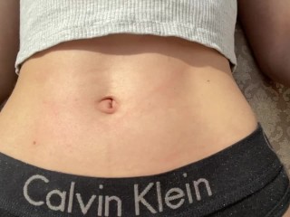 I get a tan in the sun and play with my navel