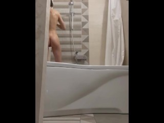 Sexy babe washes her hot body and long hair