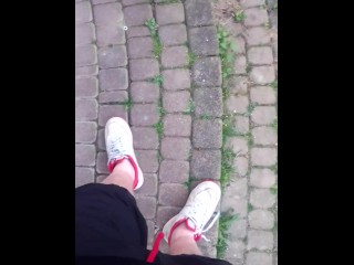 Boy Walks Outside with Air force