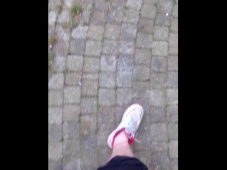 Boy Walks Outside with Air force