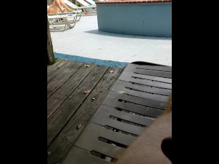 Dicks out at the pool (being watched) 