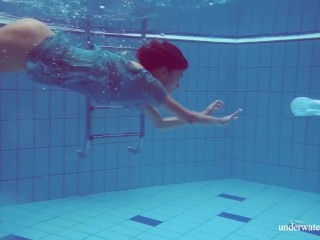 Sexy tight teen Marusia swims naked underwater