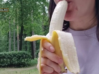 Pretty woman fucked herself with a banana in the park, and then ate it in front of people